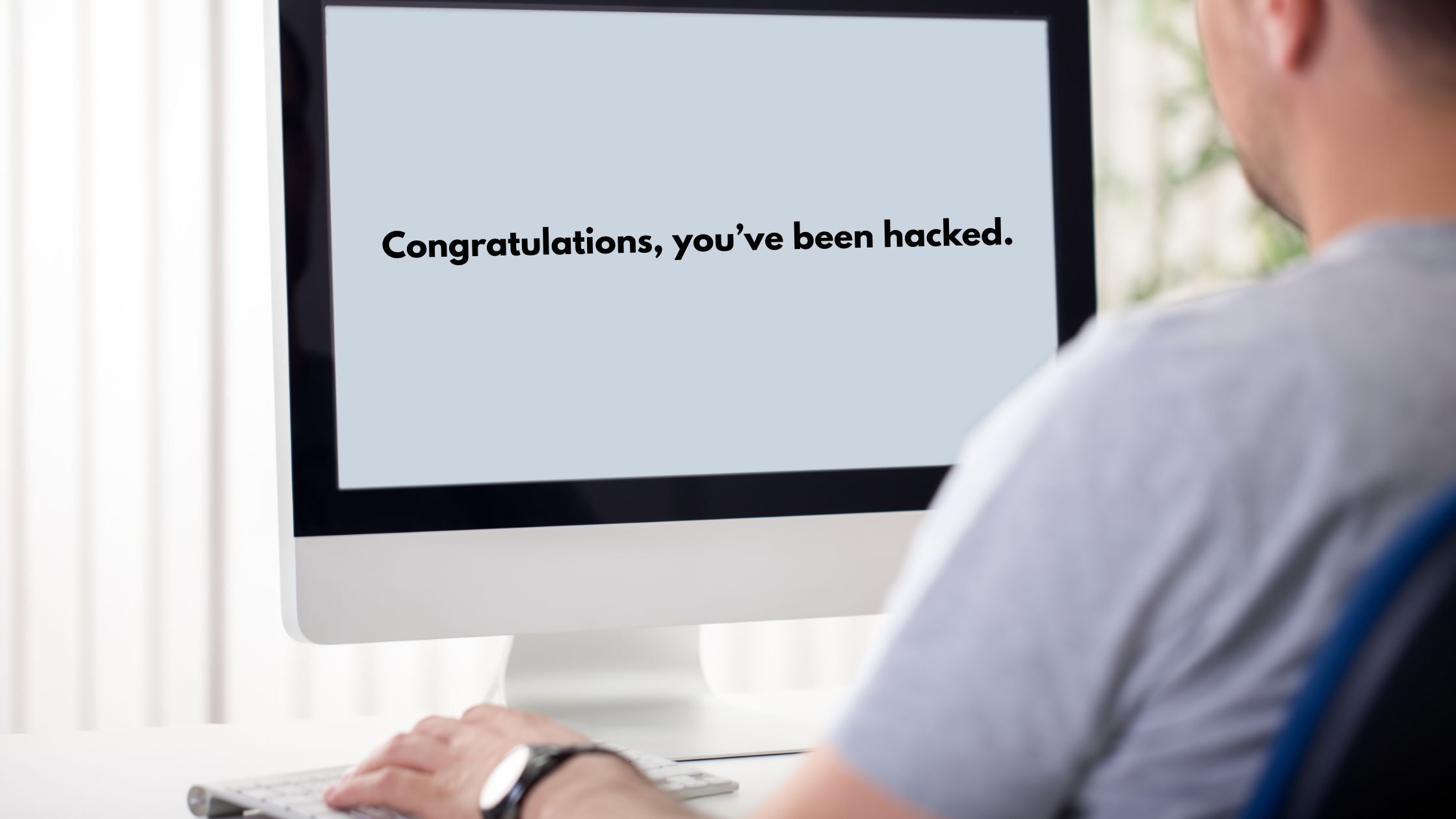 A computer screen with the text saying congratulations you've been hacked